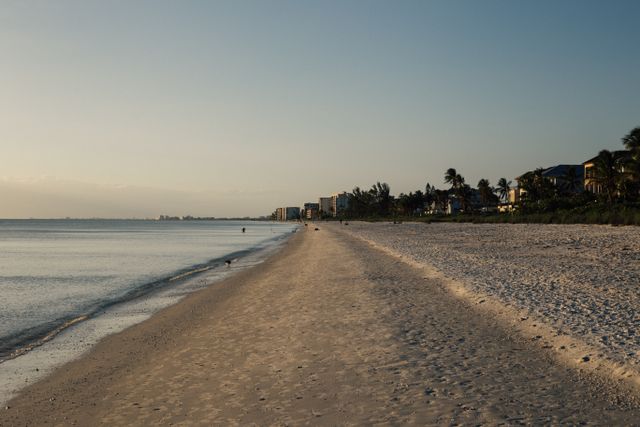 A%20vacant%20beach%20with%20sunset%20in%20background